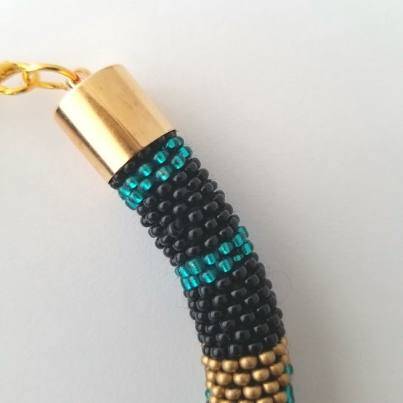 7" SEED BEAD BRACELET "RAE" WITH A GOLD, BLACK AND BLUE TONE. - Picture 2 of 4
